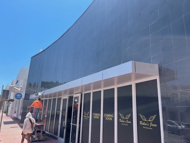 Commercial retail facade installation — Robins Jean storefront
